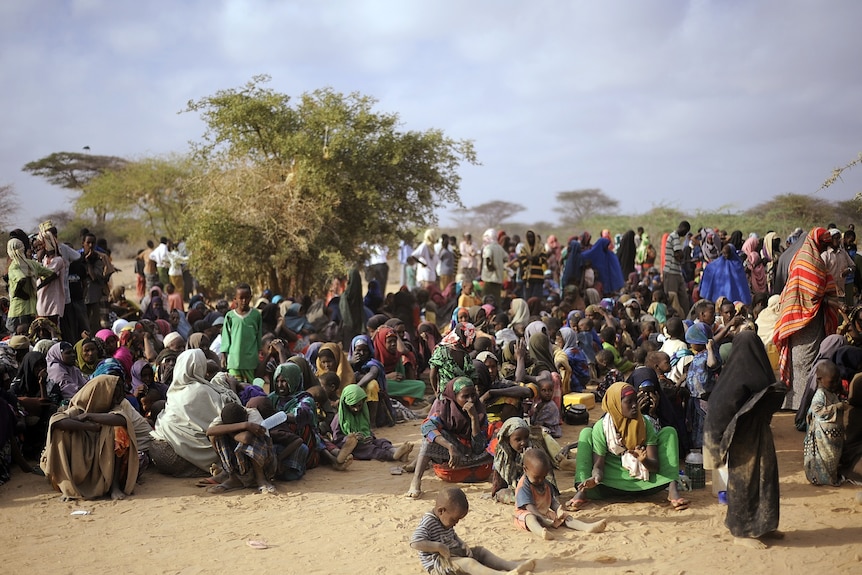 Somali refugees line up at a registration centre at the Dagahaley refugee site within the Dadaab complex