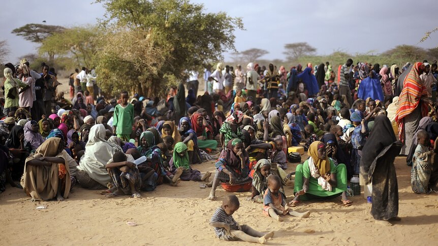 Somali refugees line up at a registration centre at the Dagahaley refugee site within the Dadaab complex