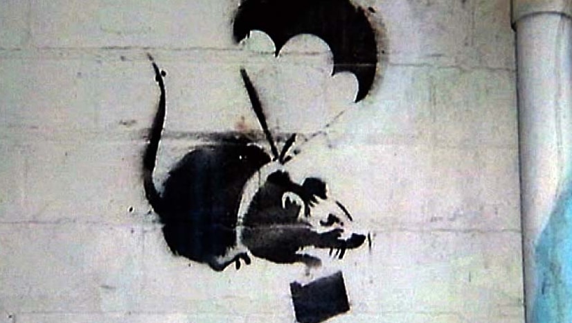 A stencil of a parachuting rat by famous street artist Banksy that was on a wall in Prahran