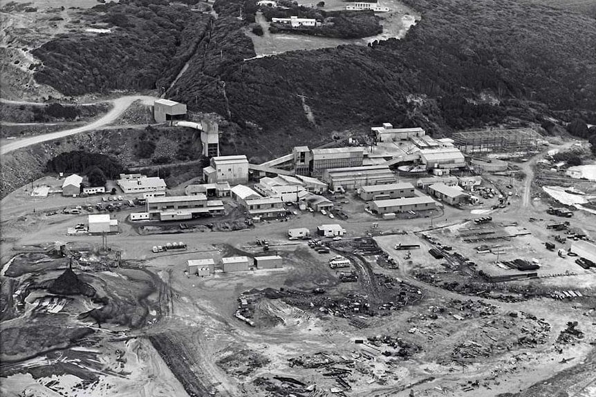 Black and white aerial view of mine and buildings.