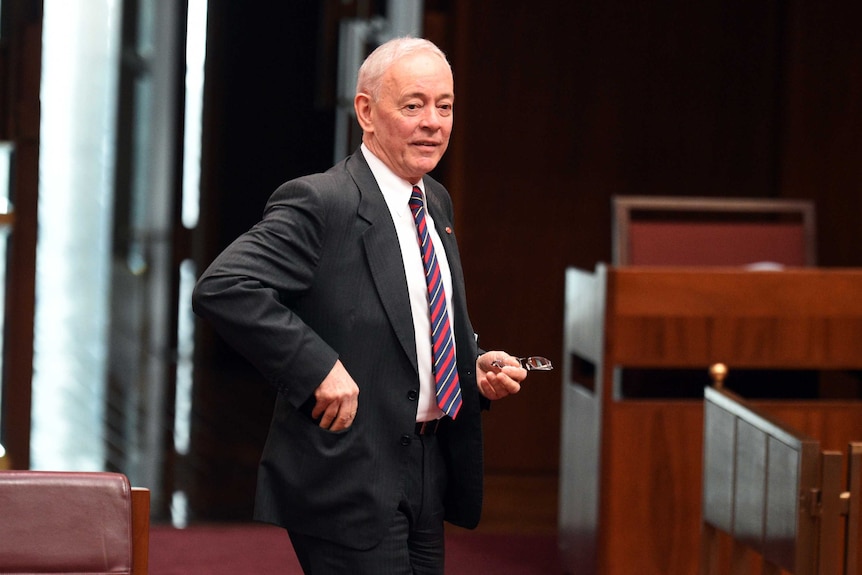 Australian Senator Bob Day is seen arriving before Federal Labor Senator Pat Dodson (not pictured) is sworn in during a senate sitting session at Australian Parliament House, in Canberra, Monday, May 2, 2016.