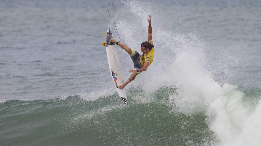 South African Jordy Smith completes an aerial manoeuvre