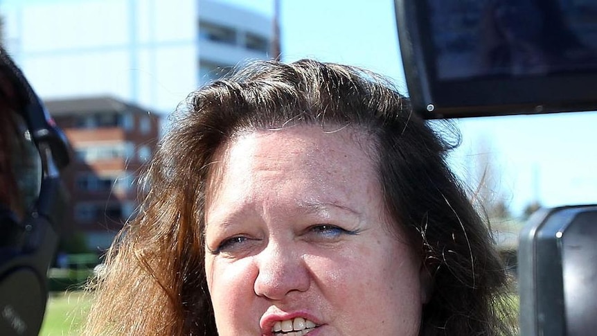 Gina Rinehart, chairman of Hancock Prospecting, joins protesters as they rally in Perth