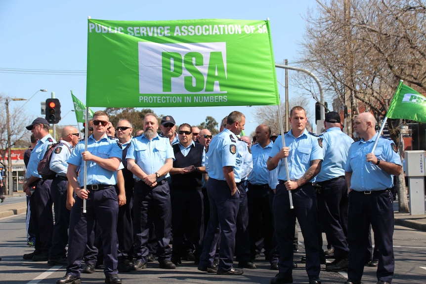 Prison officers marching