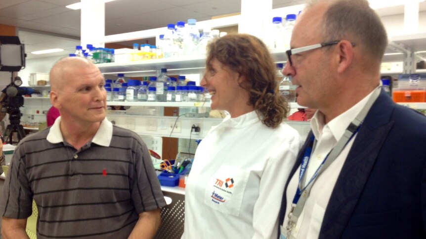 (LtoR) Chemotherapy patient Robert Simpson, with Associate Professor Ingrid Winkler and Professor Andrew Perkins