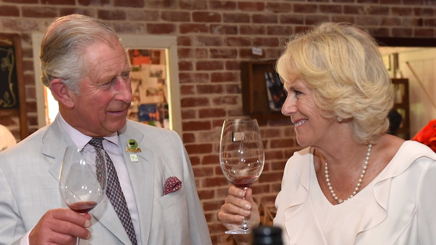 Prince Charles and his wife, Camilla drink wine at an Albany winery.