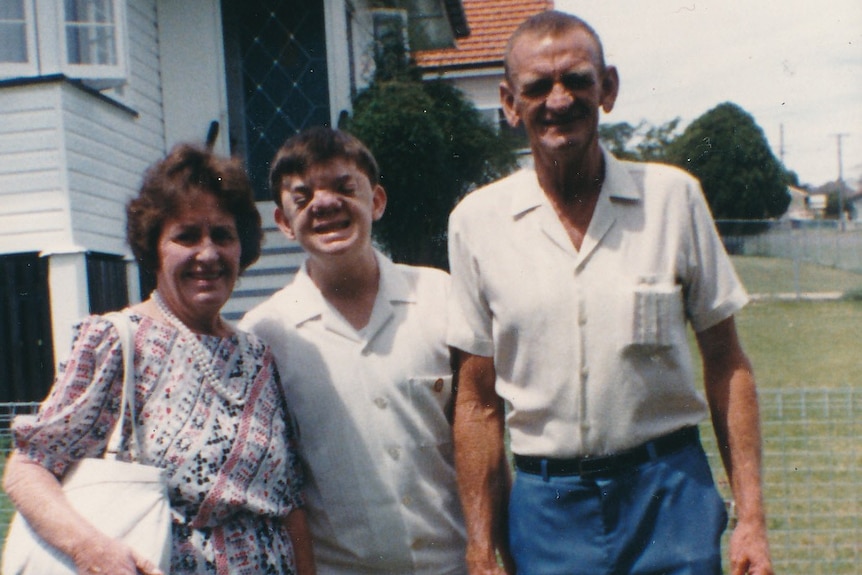 Robert Hoge with his parents aged 14, ahead of a bowls tournament.