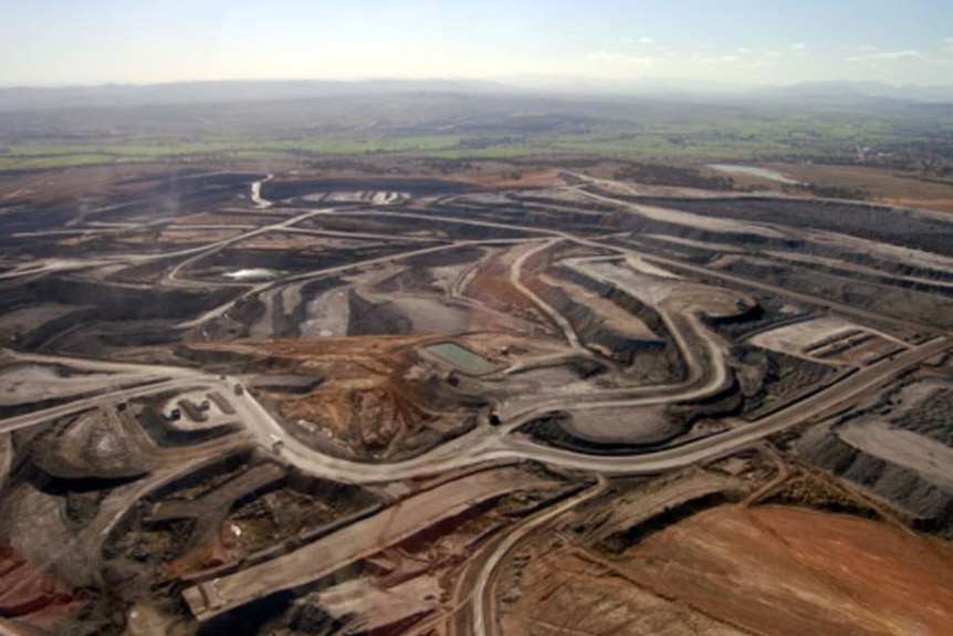 Aerial photo of a huge open cut coal mine.