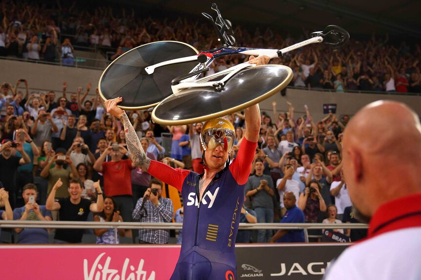 Bradley Wiggins celebrates breaking the UCI hour record at Lee Valley Velodrome on June 7, 2015.