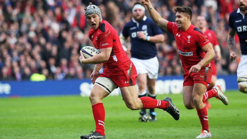 Jonathan Davies scores try for Wales against Scotland in Six Nations match at Murrayfield.