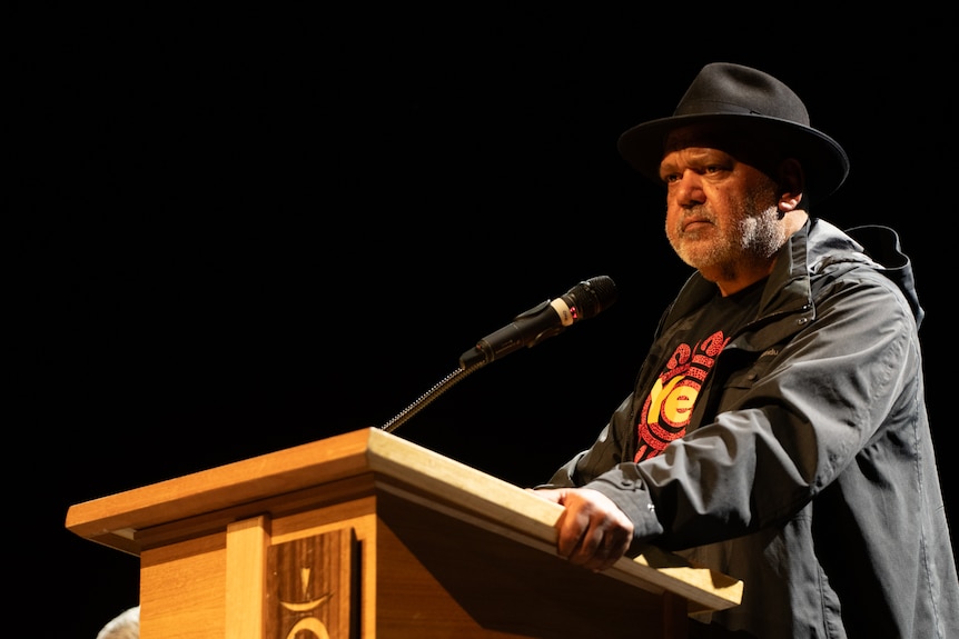 Noel Pearson speaking from a podium.