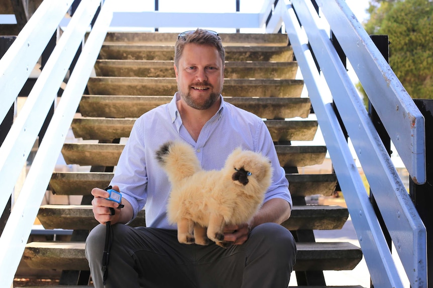 Dr Philip Roetman and model cat Willow