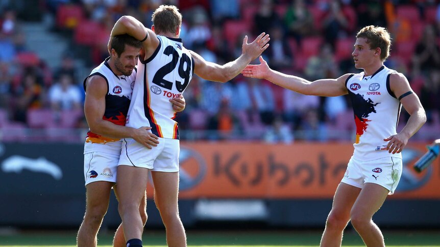 Matthew Wright and Sam Kerridge of the Crows celebrate a goal against the Giants.