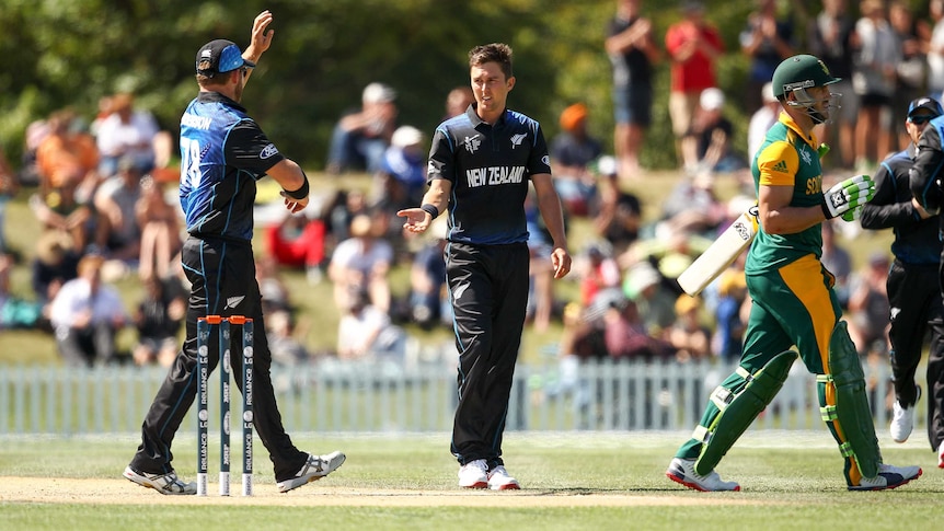 New Zealand's Trent Boult celebrates the wicket of South Africa's David Miller