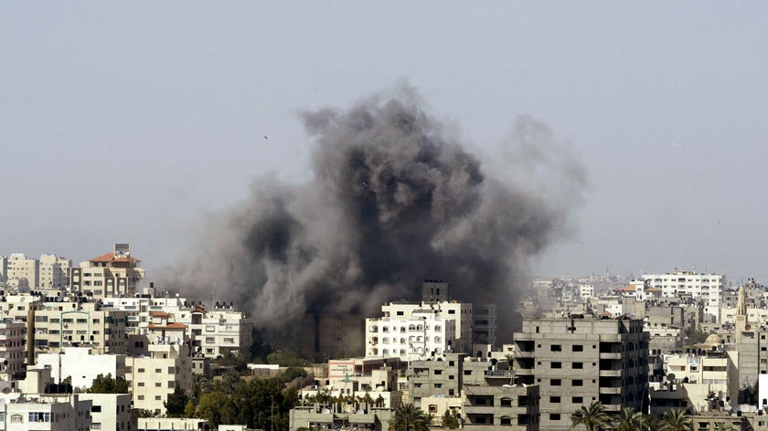 Smoke rises from a Hamas security force position after an Israeli air strike in Gaza