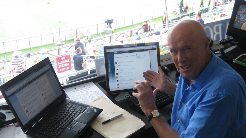 Kerry O'Keeffe in the broadcast box at the Gabba in Brisbane.