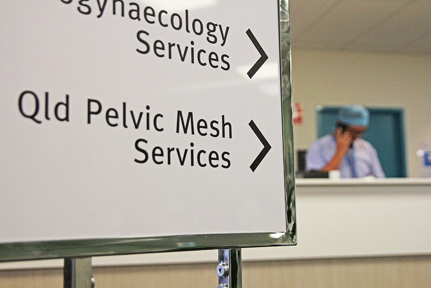 A sign inside a hospital reads QLD Pelvic mesh services