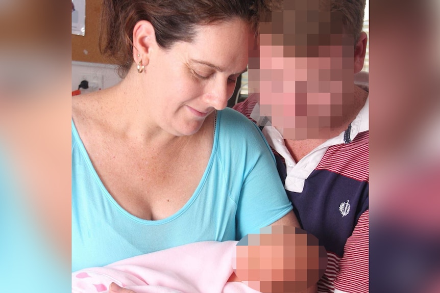 Bedford mother Mara Quinn stands holding a newborn baby alongside a man with a pixelated face.