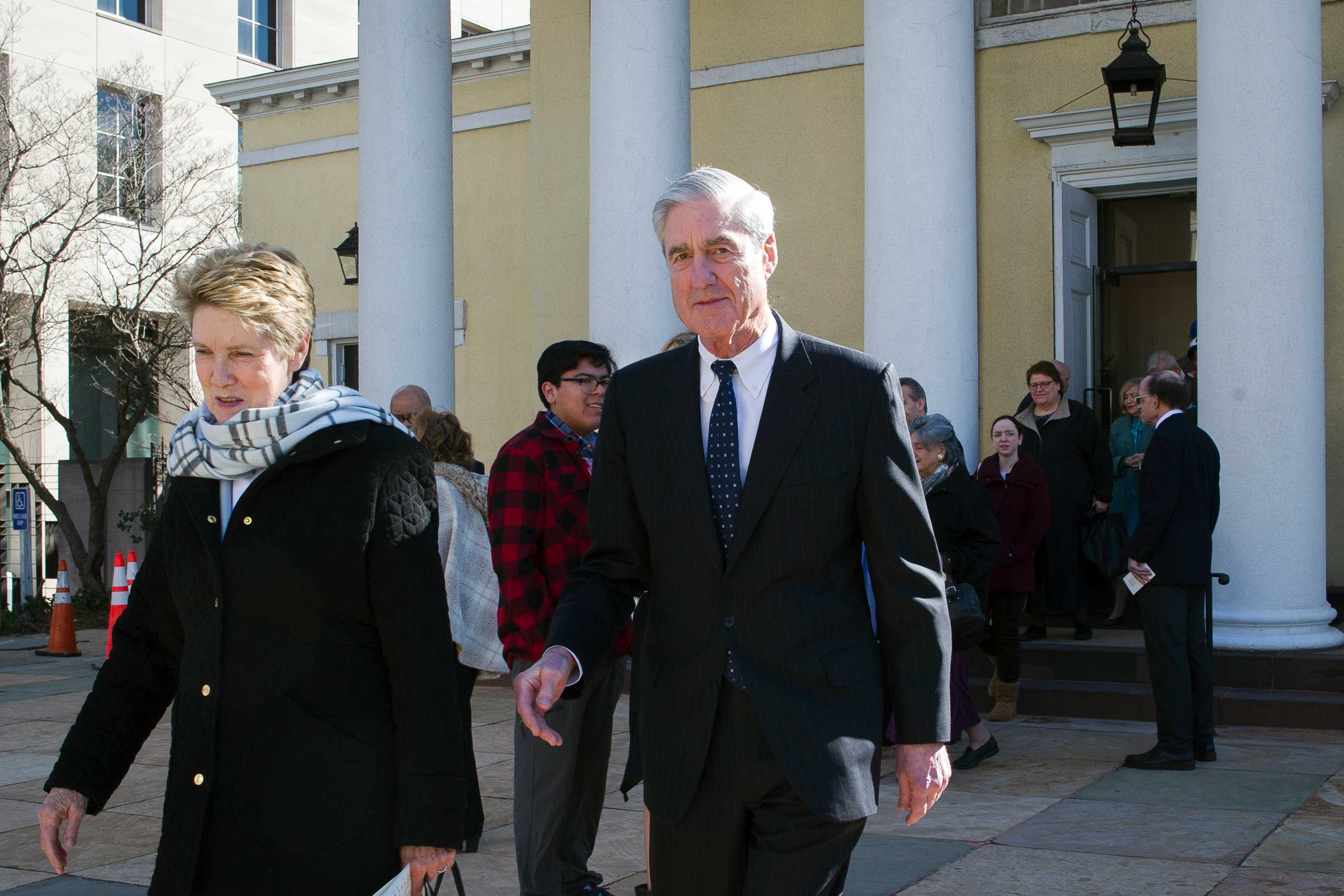 Special counsel Robert Mueller and his wife Ann leave St John's Episcopal Church.