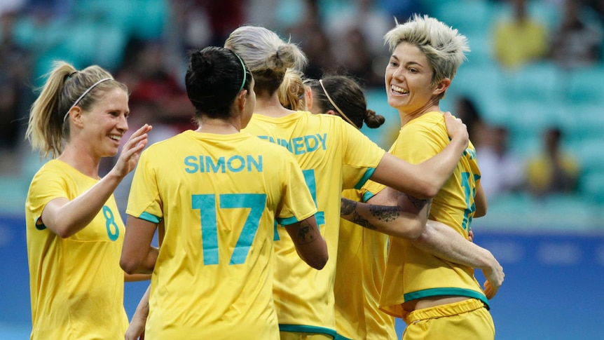Australia's Michelle Heyman (R) celebrates her goal against Zimbabwe at the Rio Olympics in 2016.