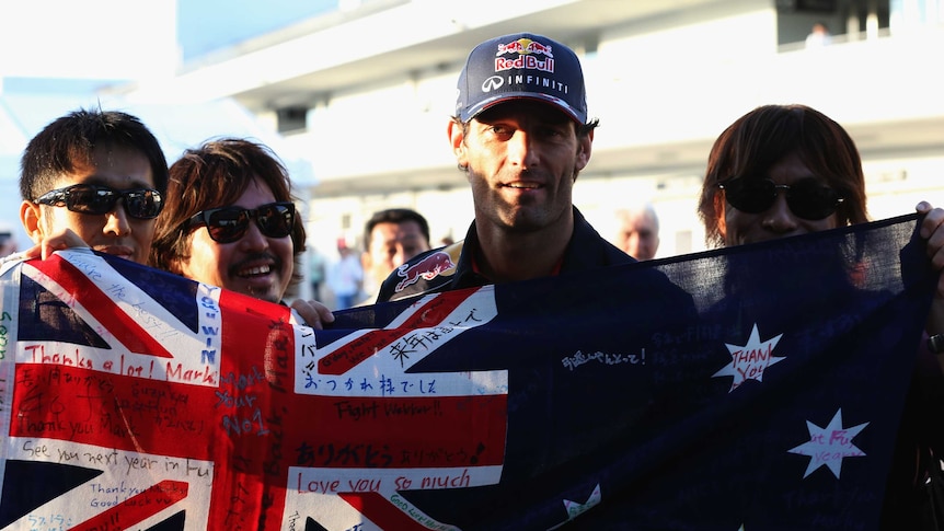 Australia's Mark Webber meets fans at the Japanese Grand Prix at Suzuka.