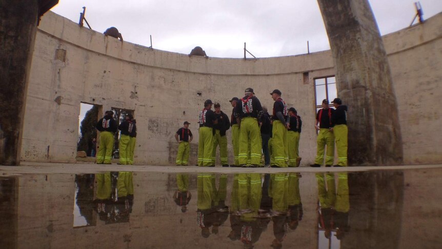 ACT firefighters meet at the Mt Stromlo Observatory ruins for the UFU ACT Branch election campaign launch