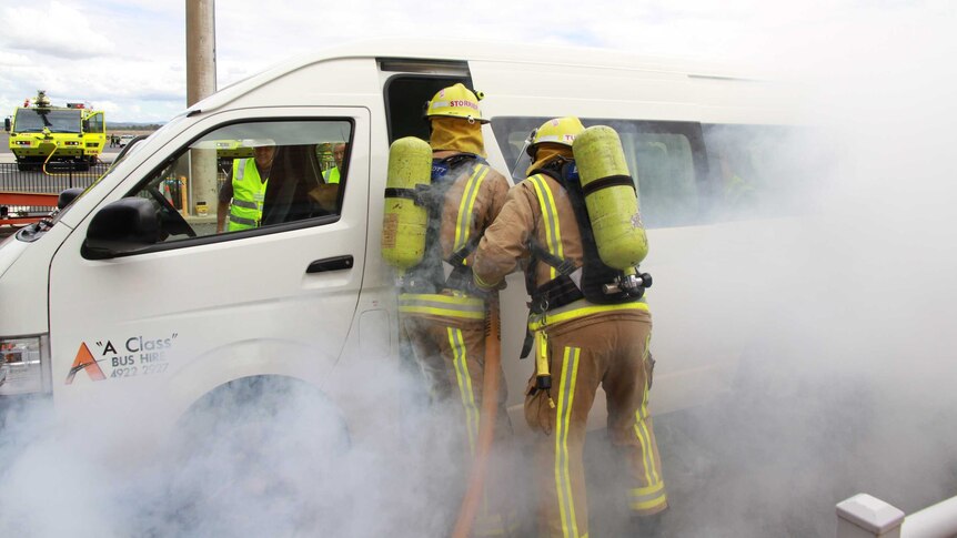 The disaster training for emergency services saw a mini-bus, posing as a plane, crash into the Rockhampton terminal.