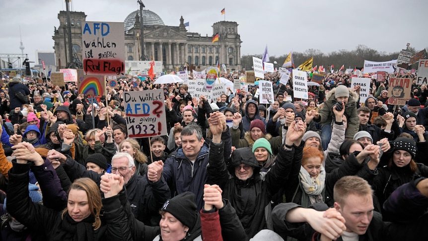 A group of protestsers in front of Germany's parliament at a demonstration against the far-right Alternative for Germany.
