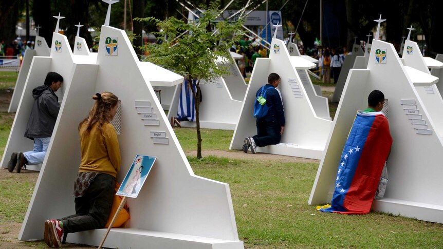 Pilgrims confess as the Pope visits Rio for World Youth Day.