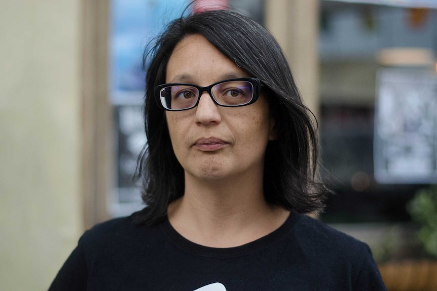 Natalie Pestana looks at the camera outside a bar in Melbourne