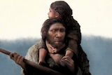 A Neanderthal father with his daughter riding on his shoulders