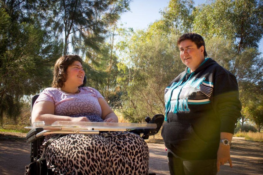 An older photo of Anita Tippl and another person.