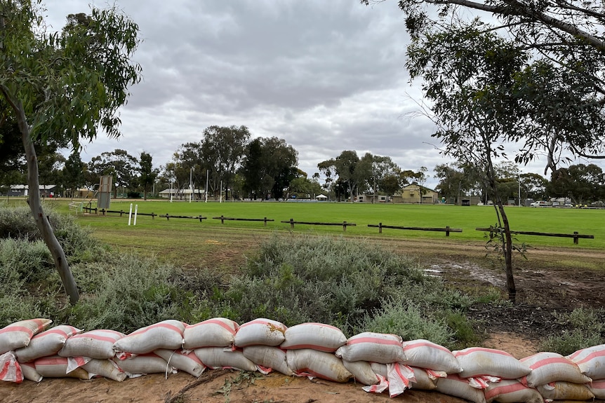 A row of sandbags have been laid protect the Nangiloc recreation reserve from flooding