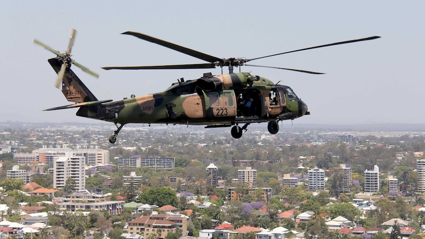 Black Hawk flies over Brisbane