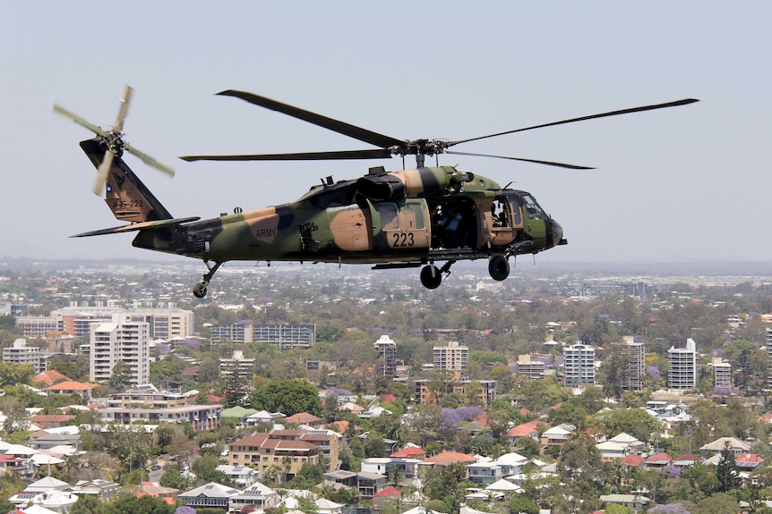 Black Hawk flies over Brisbane