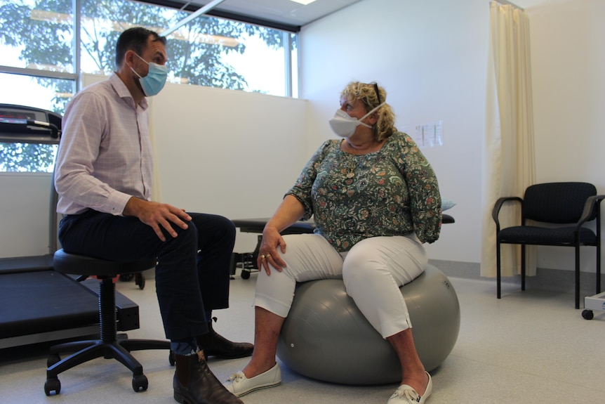 man and woman in physio office