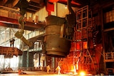 A steel foundry on the outskirts of Beijing pouring molten iron ore.