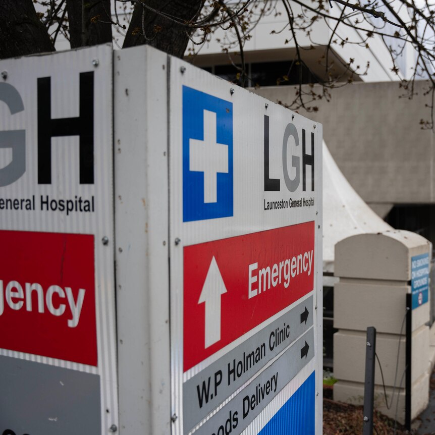 A sign with LGH and emergency written on it.
