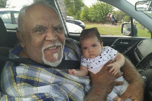 Richard Campbell with one of his baby grandchildren