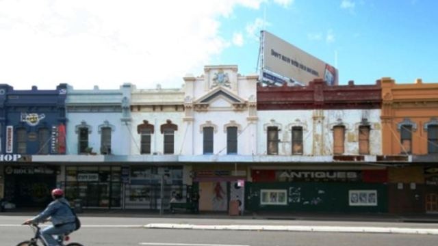 A row of rundown shop fronts along Newcastle's Hunter Street.