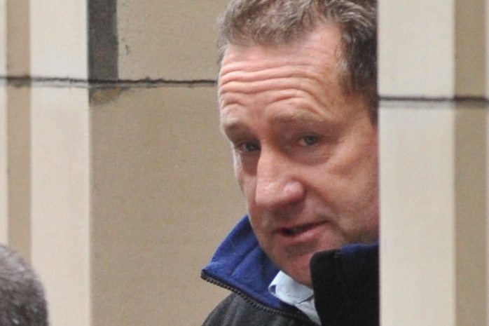Geoffrey Armour led into prison van