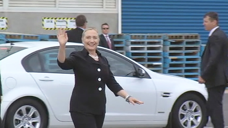 A wave from Hillary Clinton on her arrival at Techport