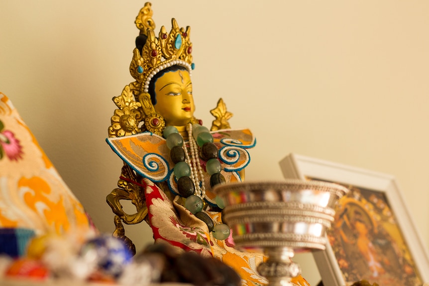 A Buddhist deity on an altar during Tibetan New Year.