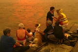 Locals shelter from the bushfire at Murdunna.