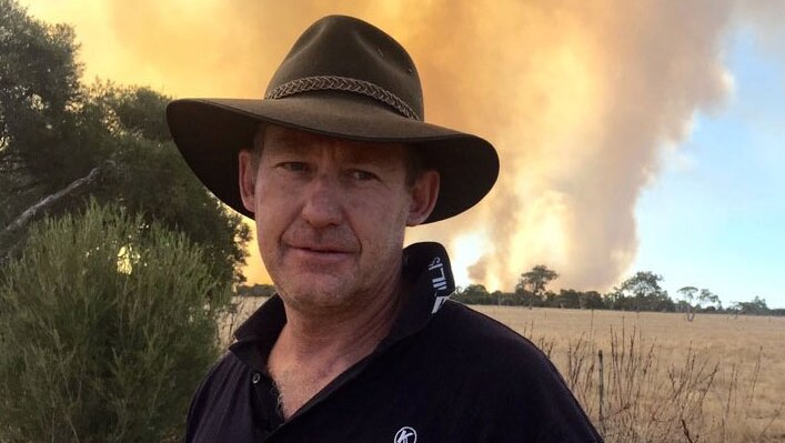 Rodney Ingram has chosen to stay and defend his property at Wokalup from a bushfire burning in South West WA