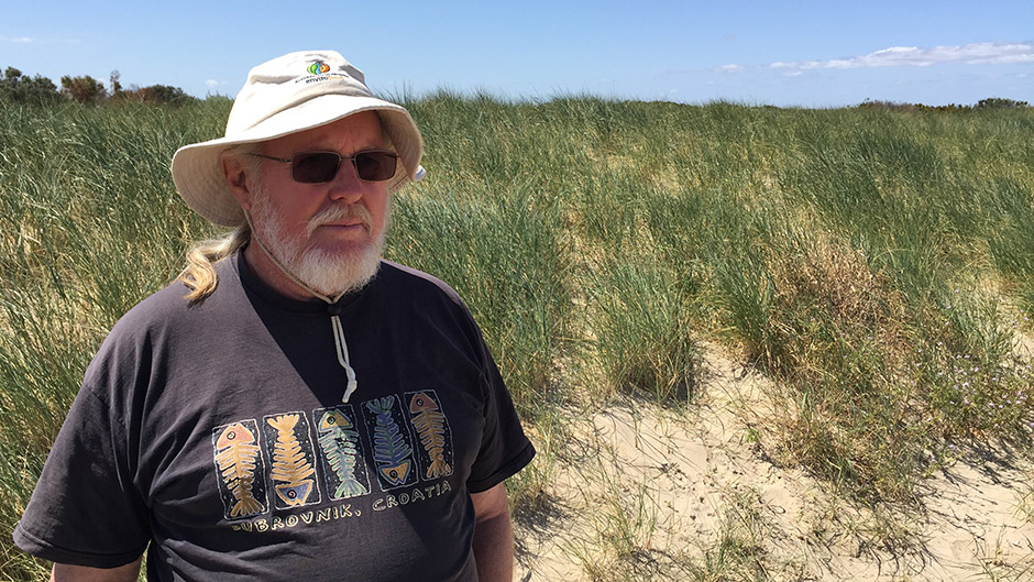 Conservationist Richard Owen stands at the mouth of the Murray River.