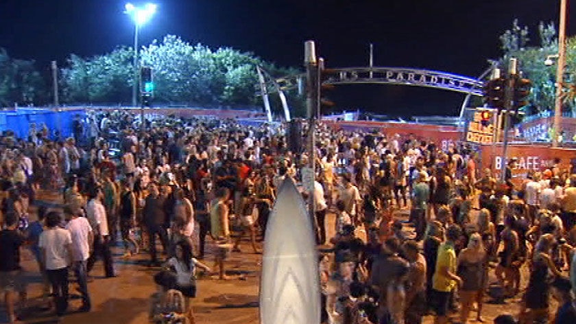 TV still of crowd of schoolies revellers at night at Surfers Paradise on Gold Coast in 2009