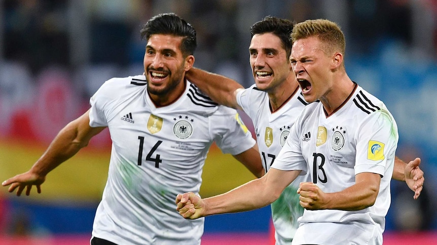 Germany's Emre Can, LArs Stindl and Joshua Kimmich celebrate in Confederations Cup final