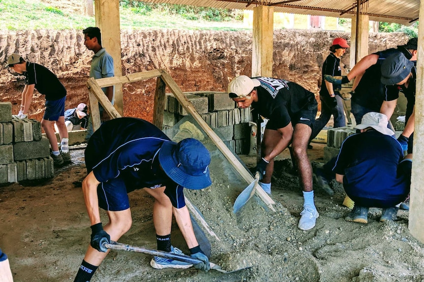 Canberra Grammar students digging concrete and carrying bricks at the Shree Kalika School in Nepal.