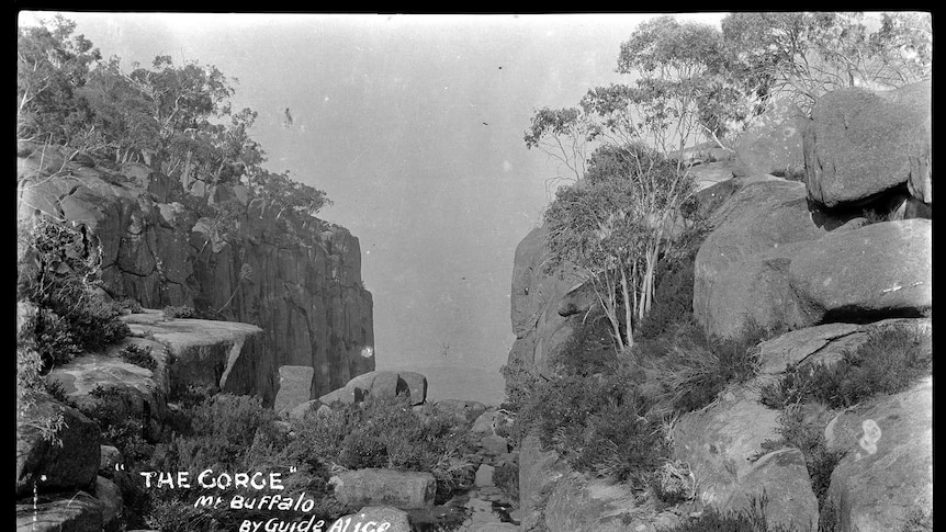 View of Mount Buffalo through rocks rising on either side